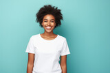 Close up of a young African American woman smiling and wearing a white t-shirt on a turquoise background. Generative AI