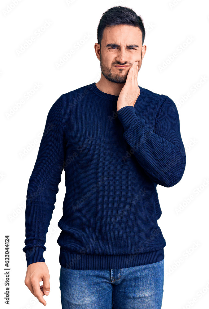 Young handsome man wearing casual clothes touching mouth with hand with painful expression because of toothache or dental illness on teeth. dentist Young handsome man wearing casual clothes touching mouth with hand with painful expression because of toothache or dental illness on teeth. dentist