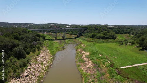 Aerial footage of the Pedernales River Bridge Highway 71 in Spicewood Texas. photo
