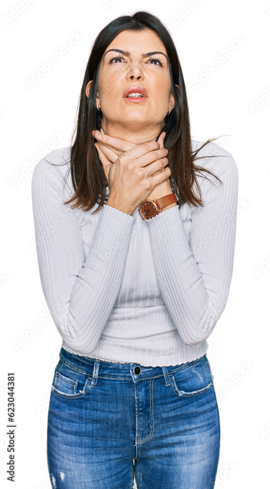 Beautiful brunette woman wearing casual clothes shouting suffocate because painful strangle. health problem. asphyxiate and suicide concept. Beautiful brunette woman wearing casual clothes shouting suffocate because painful strangle. health problem. asphyxiate and suicide concept.