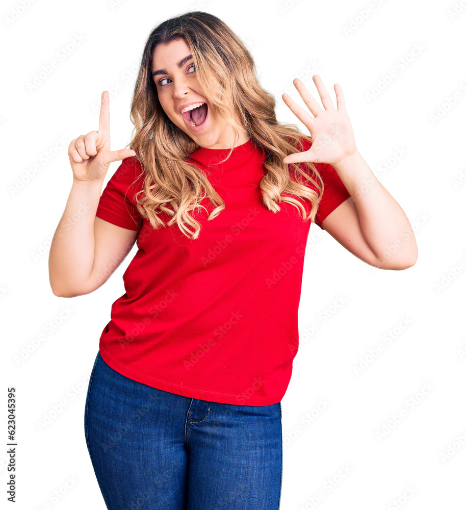 Young caucasian woman wearing casual clothes showing and pointing up with fingers number seven while smiling confident and happy. Young caucasian woman wearing casual clothes showing and pointing up with fingers number seven while smiling confident and happy.