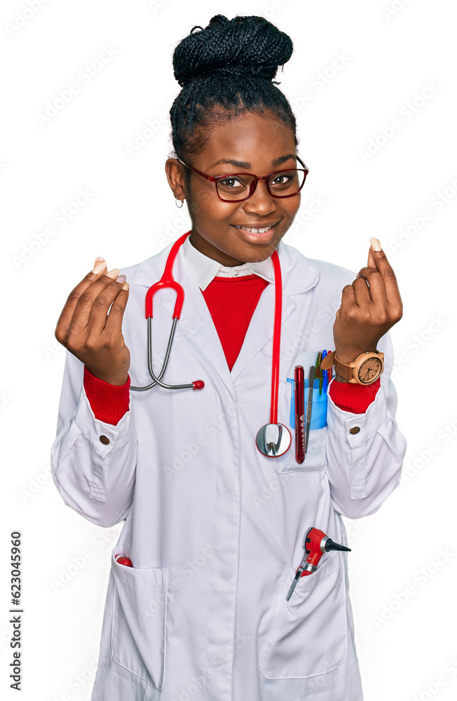 Young african american woman wearing doctor uniform and stethoscope doing money gesture with hands, asking for salary payment, millionaire business Young african american woman wearing doctor uniform and stethoscope doing money gesture with hands, asking for salary payment, millionaire business