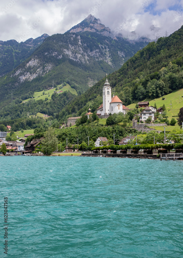Beautiful view of the mountains and the church in the city of Lucerne Switzerland