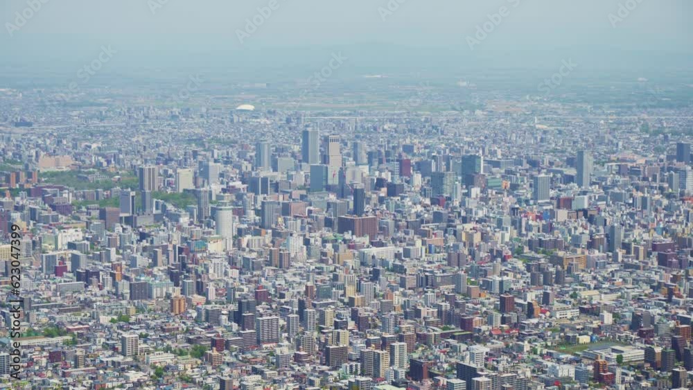 Sapporo Cityscape Metropolis Viewed From Mount Moiwa. Pan Right Shot Sapporo Cityscape Metropolis Viewed From Mount Moiwa. Pan Right Shot