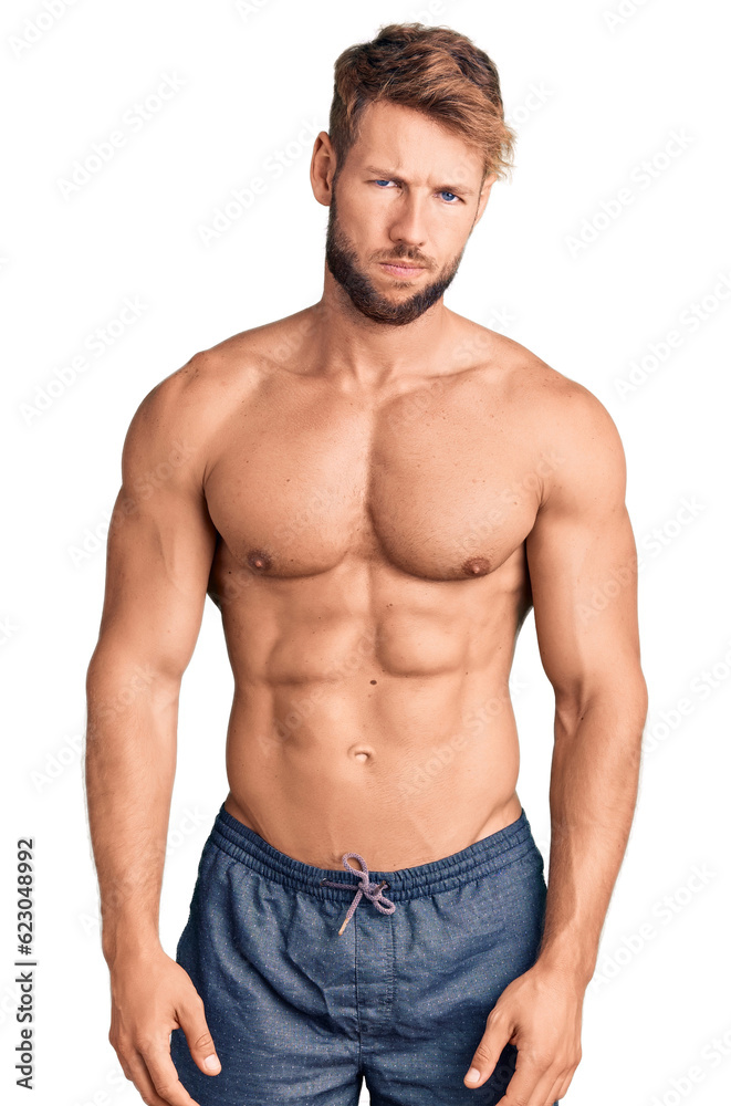 Young caucasian man standing shirtless skeptic and nervous, frowning upset because of problem. negative person.