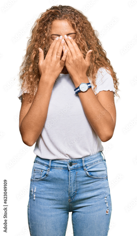 Beautiful caucasian teenager girl wearing casual white tshirt rubbing eyes for fatigue and headache, sleepy and tired expression. vision problem Beautiful caucasian teenager girl wearing casual white tshirt rubbing eyes for fatigue and headache, sleepy and tired expression. vision problem