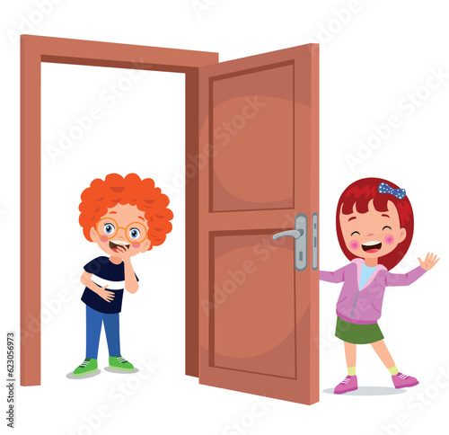 little kid standing and holding door knob