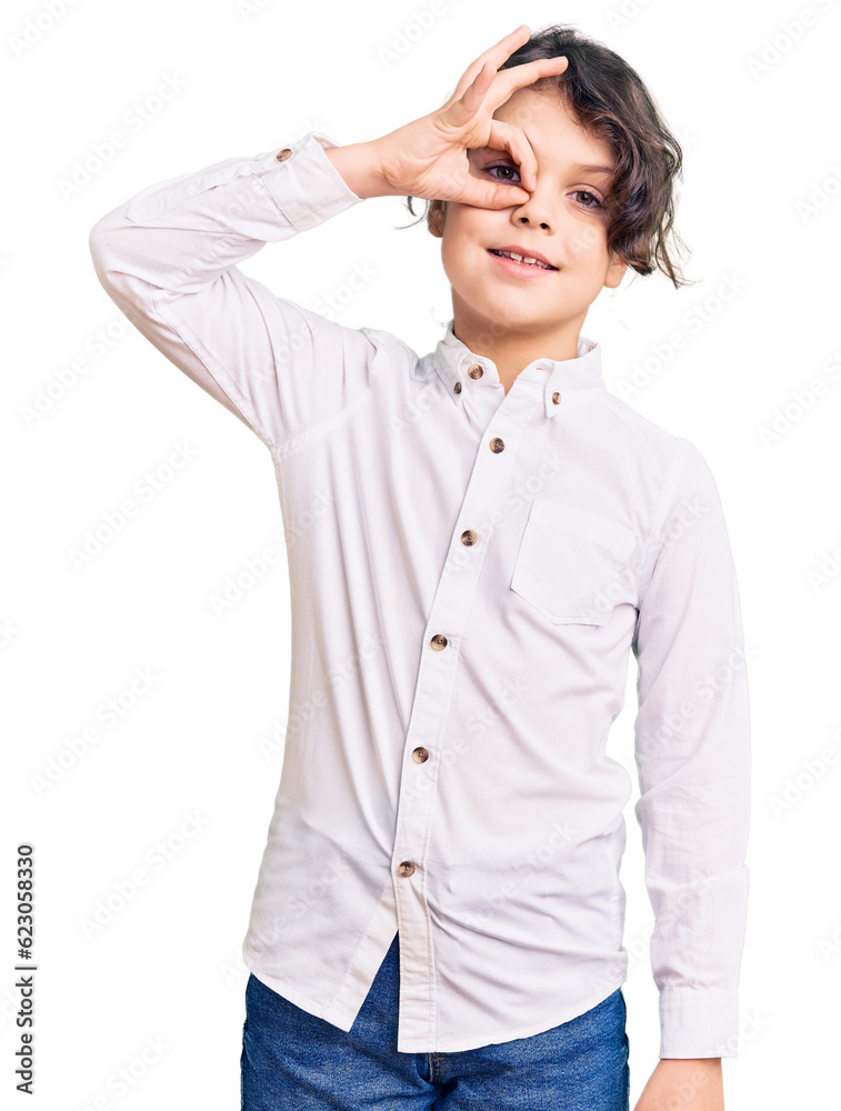 Cute hispanic child wearing casual clothes smiling happy doing ok sign with hand on eye looking through fingers Cute hispanic child wearing casual clothes smiling happy doing ok sign with hand on eye looking through fingers