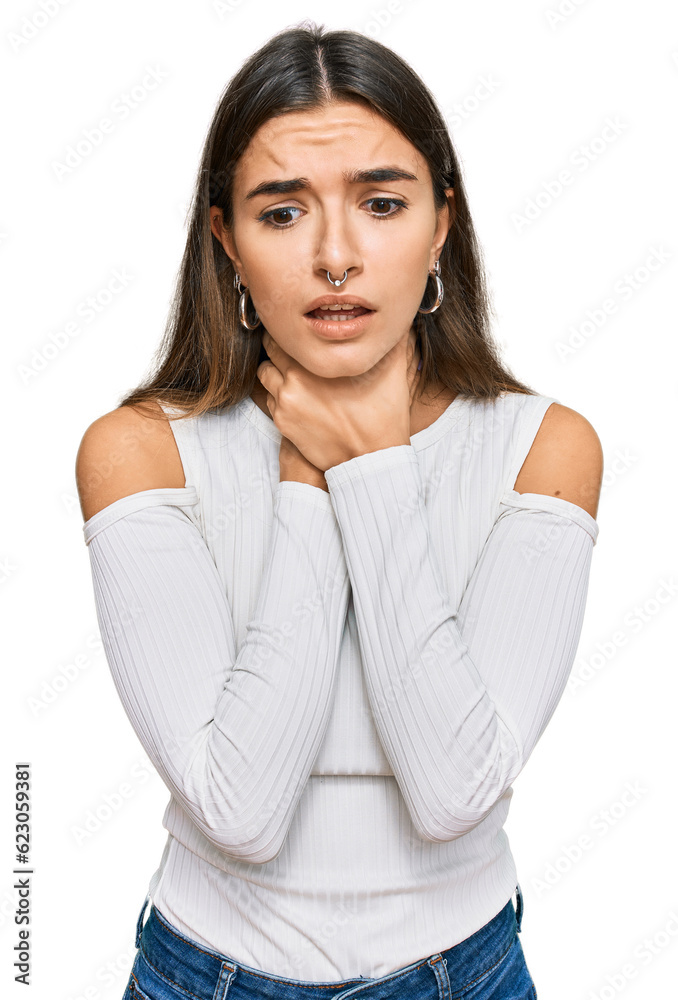 Young hispanic woman wearing casual clothes shouting and suffocate because painful strangle. health problem. asphyxiate and suicide concept. Young hispanic woman wearing casual clothes shouting and suffocate because painful strangle. health problem. asphyxiate and suicide concept.