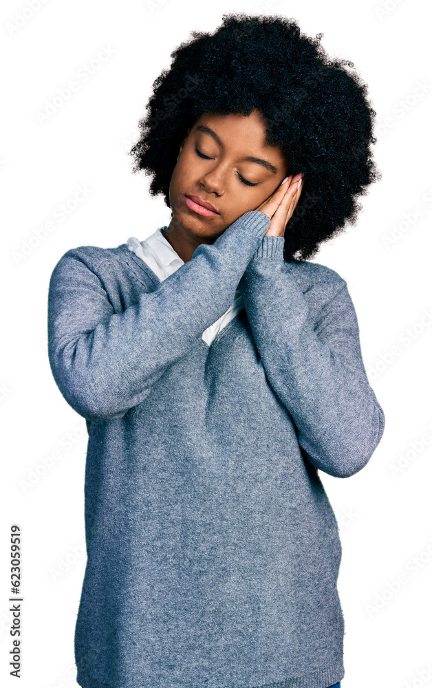 Young african american woman wearing business clothes sleeping tired dreaming and posing with hands together while smiling with closed eyes. Young african american woman wearing business clothes sleeping tired dreaming and posing with hands together while smiling with closed eyes.