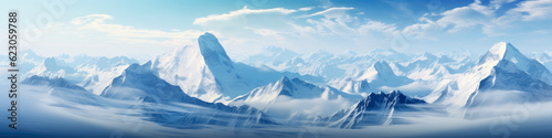 Majestic mountain range covered in snow banner.