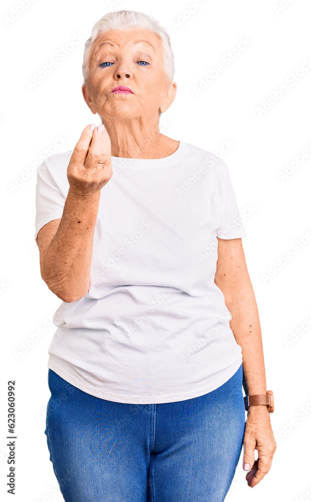 Senior beautiful woman with blue eyes and grey hair wearing casual white tshirt doing italian gesture with hand and fingers confident expression Senior beautiful woman with blue eyes and grey hair wearing casual white tshirt doing italian gesture with hand and fingers confident expression