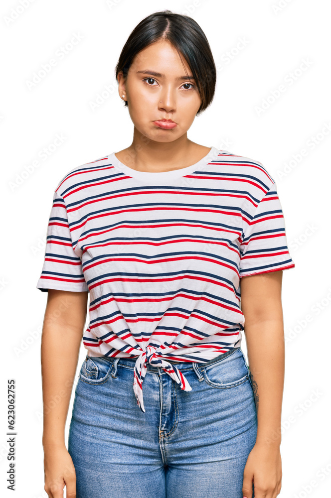 Beautiful young woman with short hair wearing casual clothes depressed and worry for distress, crying angry and afraid. sad expression. Beautiful young woman with short hair wearing casual clothes depressed and worry for distress, crying angry and afraid. sad expression.