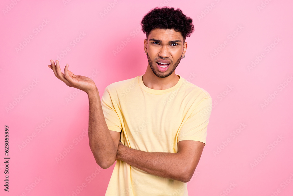 Portrait of unhappy aggressive furious guy with stylish haircut wear trendy shirt conflicting quarrel isolated on pink color background Portrait of unhappy aggressive furious guy with stylish haircut wear trendy shirt conflicting quarrel isolated on pink color background