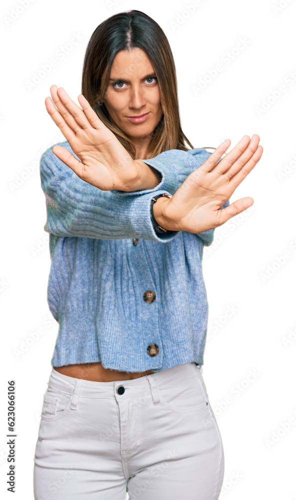 Young woman wearing casual clothes rejection expression crossing arms and palms doing negative sign, angry face