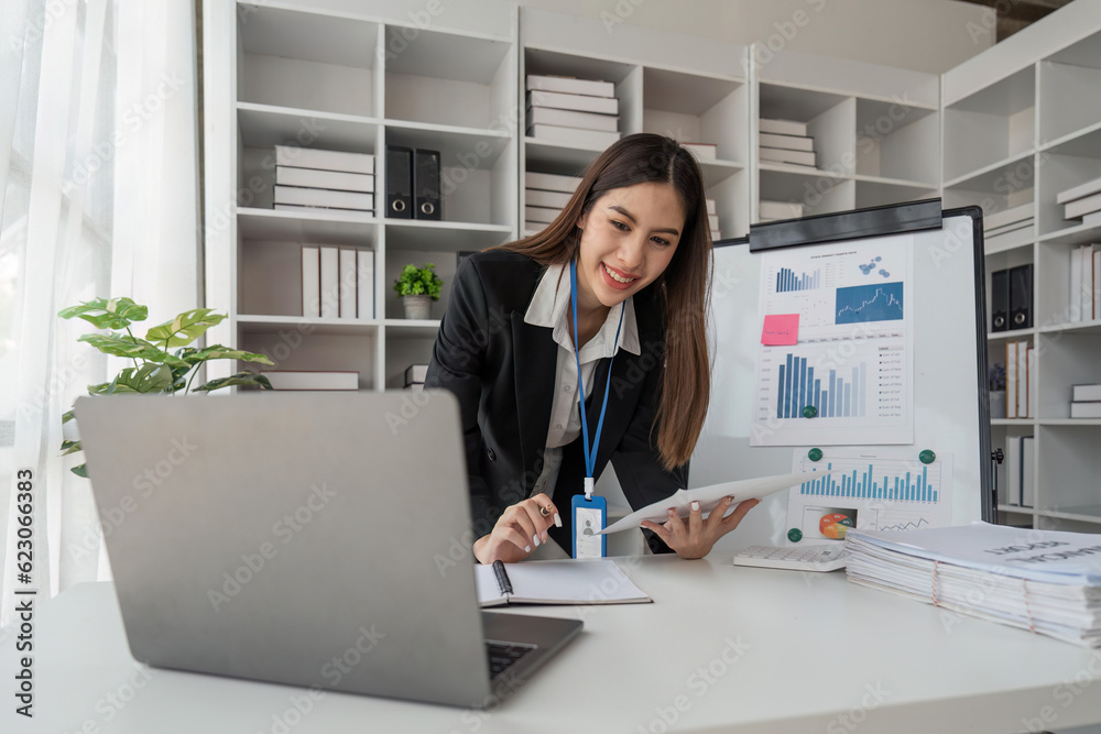 Accountant or business woman working with calculator and laptop computer, Tax deduction planning concept. Business woman calculating business balance prepare tax reduction Accountant or business woman working with calculator and laptop computer, Tax deduction planning concept. Business woman calculating business balance prepare tax reduction