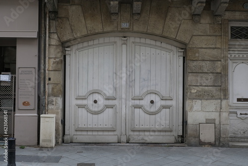 Interesting door design  with nice shapes and materials. Shot in Paris.
