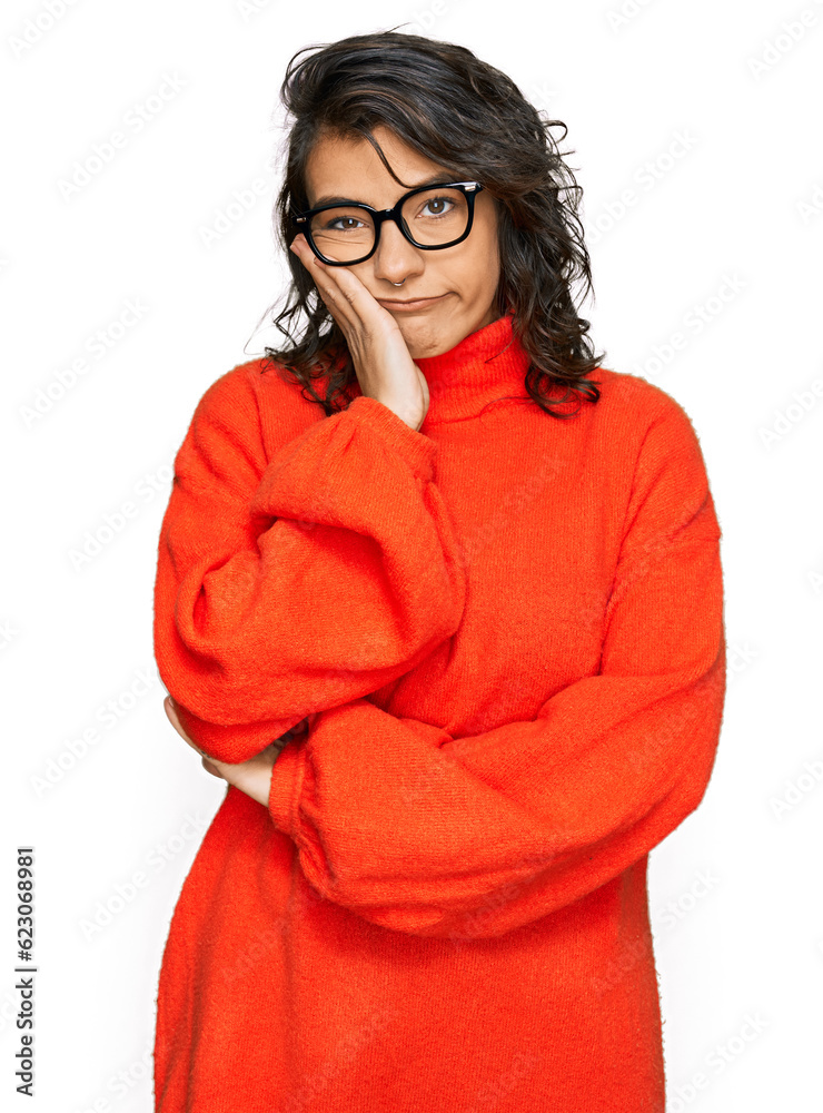 Young hispanic woman wearing casual clothes and glasses thinking looking tired and bored with depression problems with crossed arms.