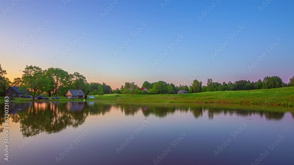 Architectures At The Lakeshore With Scenic View Of Sunrise To Sunset Reflections. Timelapse Architectures At The Lakeshore With Scenic View Of Sunrise To Sunset Reflections. Timelapse