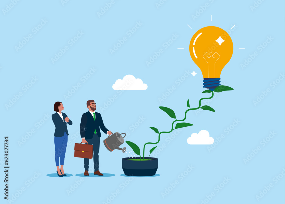 Business people watering seedling growing light bulbs in flower pot