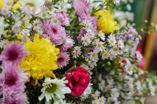 bouquet of pink yellow and white flowers