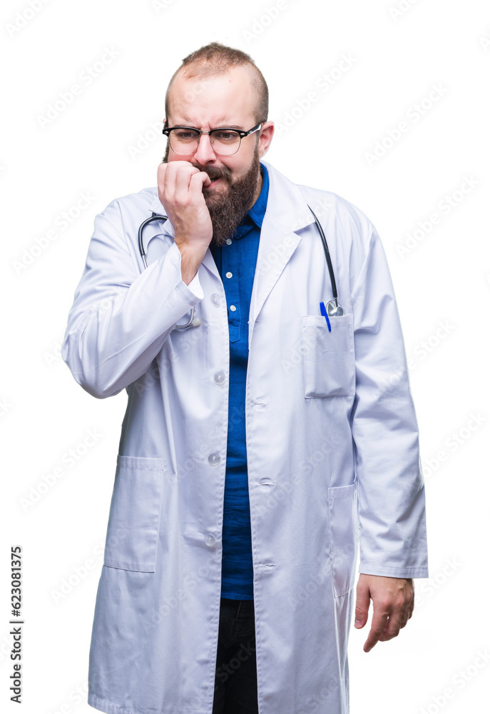 Young caucasian doctor man wearing medical white coat over isolated background looking stressed and nervous with hands on mouth biting nails. Anxiety problem. Young caucasian doctor man wearing medical white coat over isolated background looking stressed and nervous with hands on mouth biting nails. Anxiety problem.