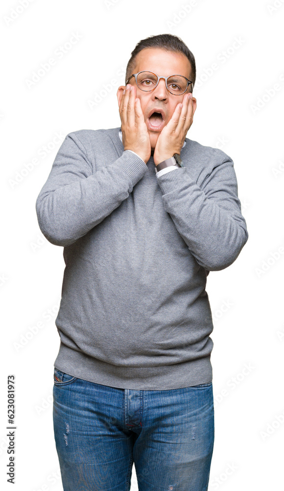 Middle age bussines arab man wearing glasses over isolated background Tired hands covering face, depression and sadness, upset and irritated for problem Middle age bussines arab man wearing glasses over isolated background Tired hands covering face, depression and sadness, upset and irritated for problem