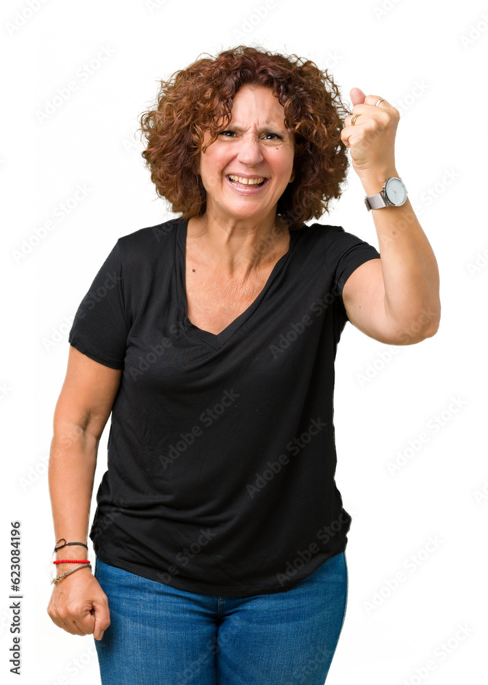 Beautiful middle ager senior woman over isolated background angry and mad raising fist frustrated and furious while shouting with anger. Rage and aggressive concept. Beautiful middle ager senior woman over isolated background angry and mad raising fist frustrated and furious while shouting with anger. Rage and aggressive concept.