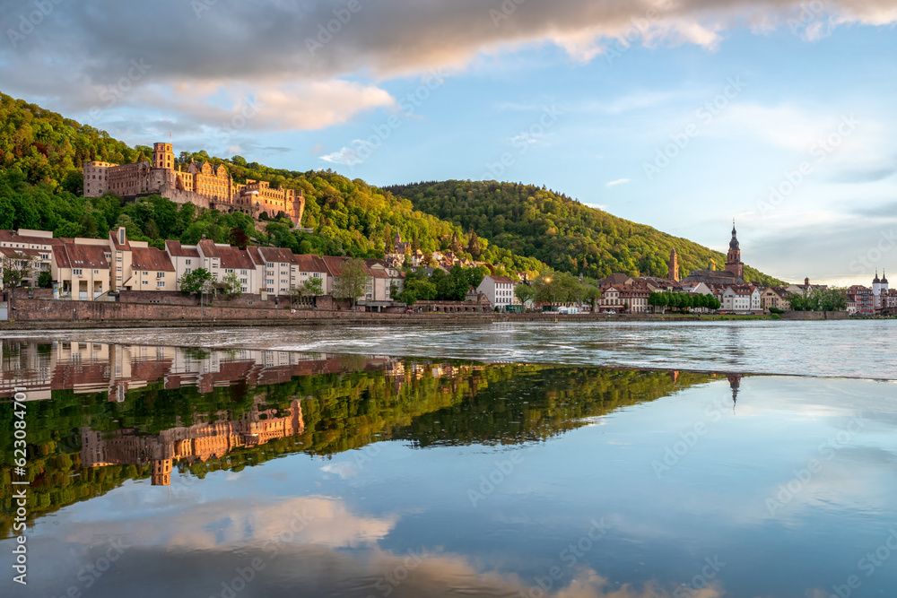 Heidelberg Castle along the Neckar River at sunset, Germany Heidelberg Castle along the Neckar River at sunset, Germany