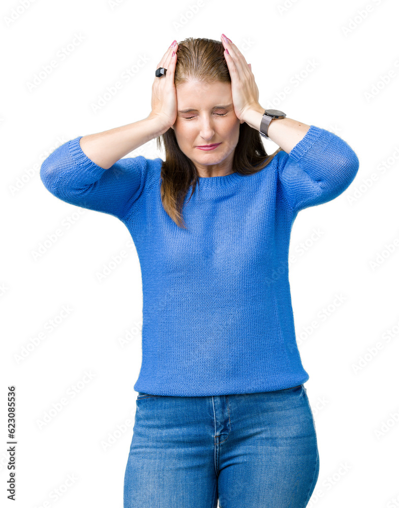 Beautiful middle age mature woman wearing winter sweater over isolated background suffering from headache desperate and stressed because pain and migraine. Hands on head. Beautiful middle age mature woman wearing winter sweater over isolated background suffering from headache desperate and stressed because pain and migraine. Hands on head.
