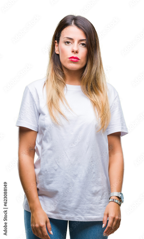 Young beautiful woman casual white t-shirt over isolated background with serious expression on face. Simple and natural looking at the camera. Young beautiful woman casual white t-shirt over isolated background with serious expression on face. Simple and natural looking at the camera.