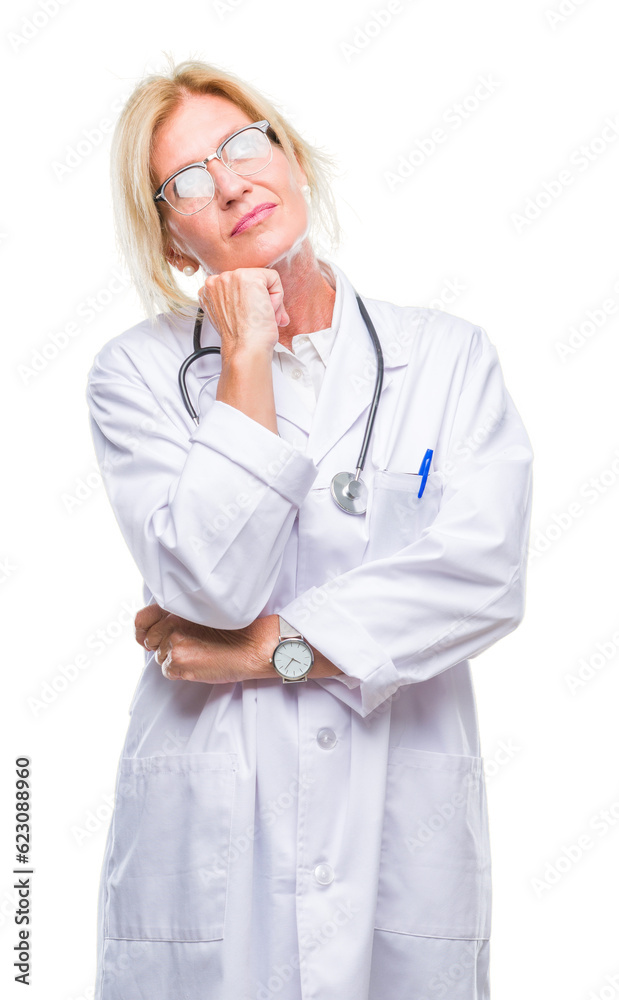 Middle age blonde doctor woman over isolated background with hand on chin thinking about question, pensive expression. Smiling with thoughtful face. Doubt concept. Middle age blonde doctor woman over isolated background with hand on chin thinking about question, pensive expression. Smiling with thoughtful face. Doubt concept.