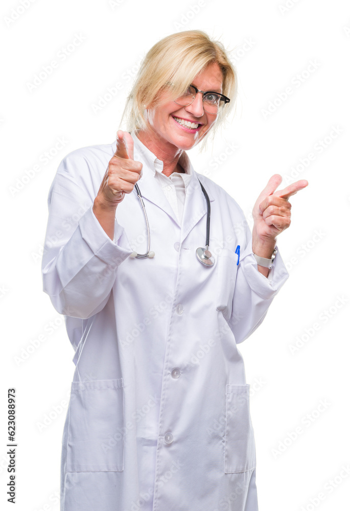 Middle age blonde doctor woman over isolated background pointing fingers to camera with happy and funny face. Good energy and vibes. Middle age blonde doctor woman over isolated background pointing fingers to camera with happy and funny face. Good energy and vibes.