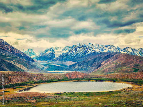 Vintage retro effect filtered hipster style image of small mountain lake in Himalayas. Spiti valley  Himachal Pradesh  India