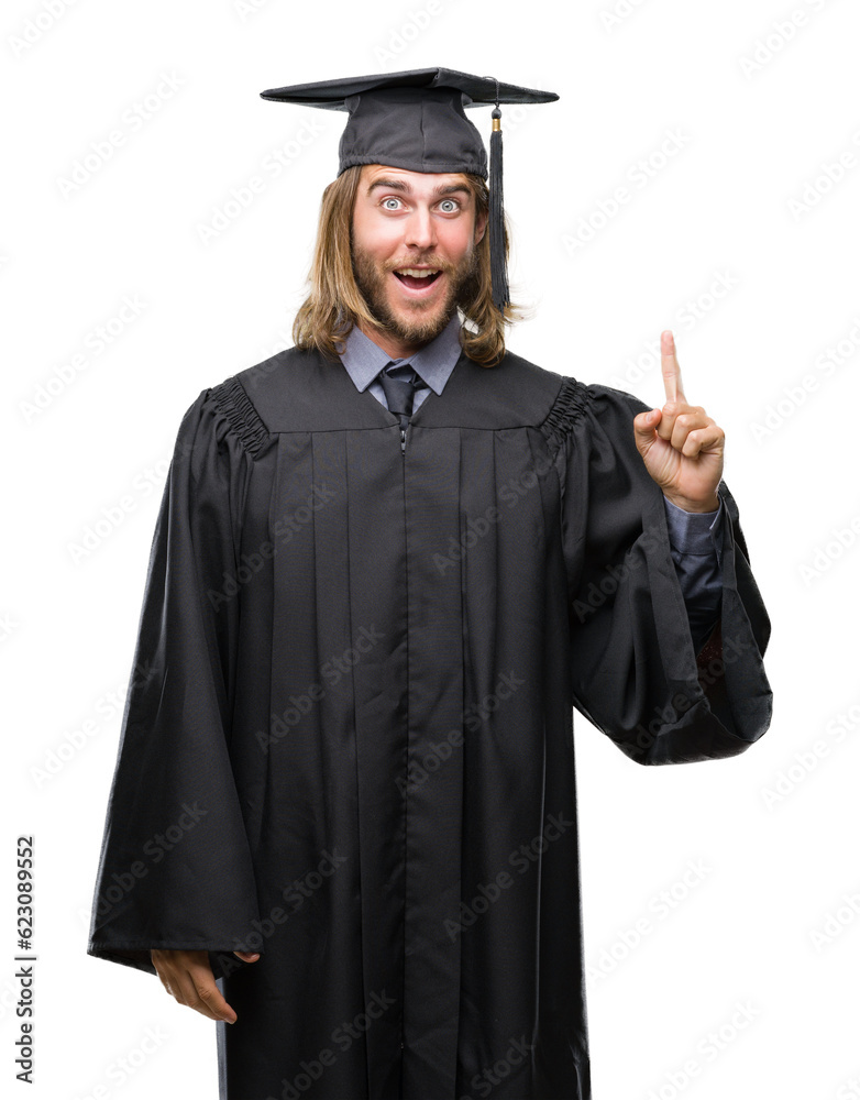 Young handsome graduated man with long hair over isolated background pointing finger up with successful idea. Exited and happy. Number one. Young handsome graduated man with long hair over isolated background pointing finger up with successful idea. Exited and happy. Number one.