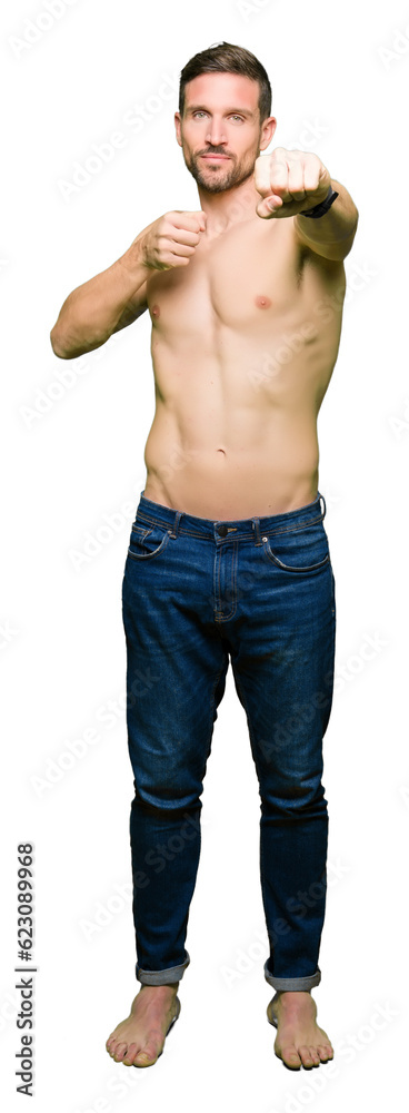 Handsome shirtless man showing nude chest Punching fist to fight, aggressive and angry attack, threat and violence Handsome shirtless man showing nude chest Punching fist to fight, aggressive and angry attack, threat and violence