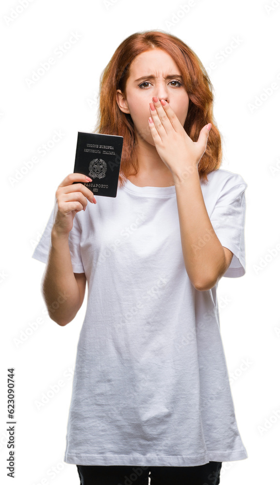 Young beautiful woman holding passport of italy over isolated background cover mouth with hand shocked with shame for mistake, expression of fear, scared in silence, secret concept Young beautiful woman holding passport of italy over isolated background cover mouth with hand shocked with shame for mistake, expression of fear, scared in silence, secret concept