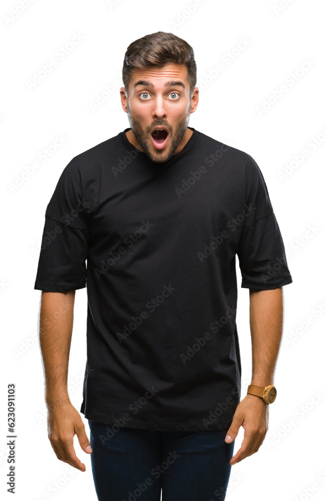 Young handsome man over isolated background afraid and shocked with surprise expression, fear and excited face. Young handsome man over isolated background afraid and shocked with surprise expression, fear and excited face.