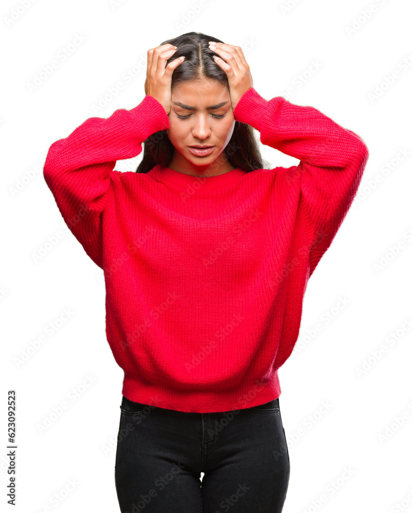Young beautiful arab woman wearing winter sweater over isolated background suffering from headache desperate and stressed because pain and migraine. Hands on head. Young beautiful arab woman wearing winter sweater over isolated background suffering from headache desperate and stressed because pain and migraine. Hands on head.