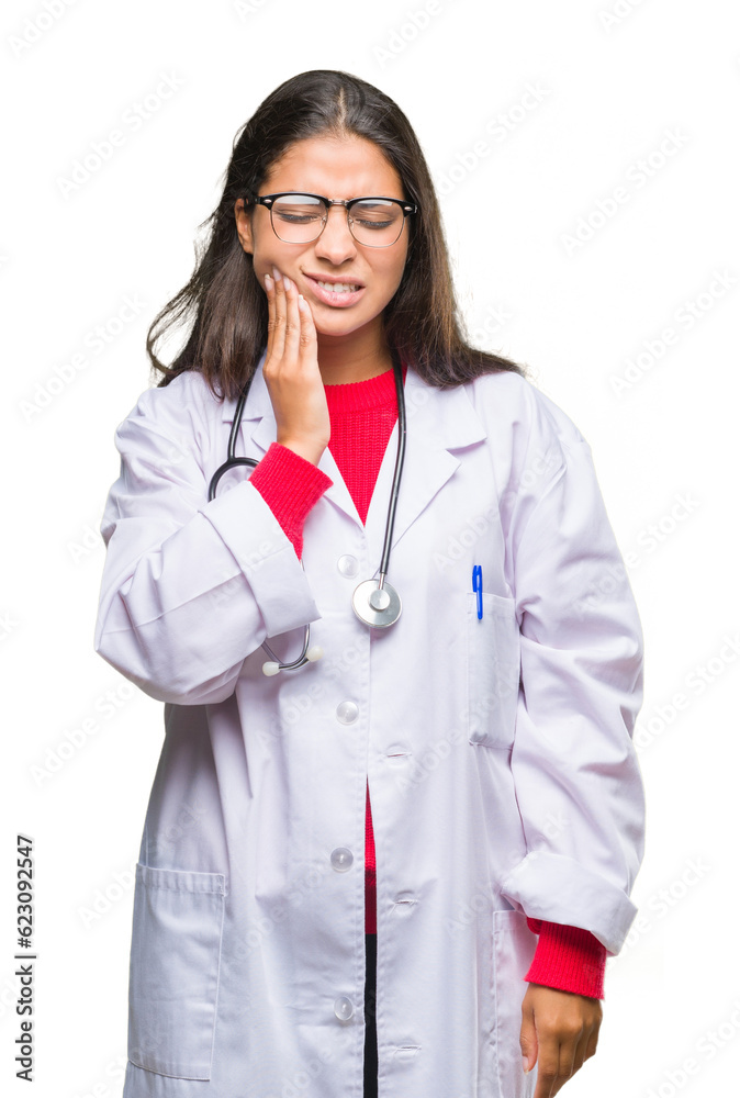 Young arab doctor woman over isolated background touching mouth with hand with painful expression because of toothache or dental illness on teeth. Dentist concept. Young arab doctor woman over isolated background touching mouth with hand with painful expression because of toothache or dental illness on teeth. Dentist concept.