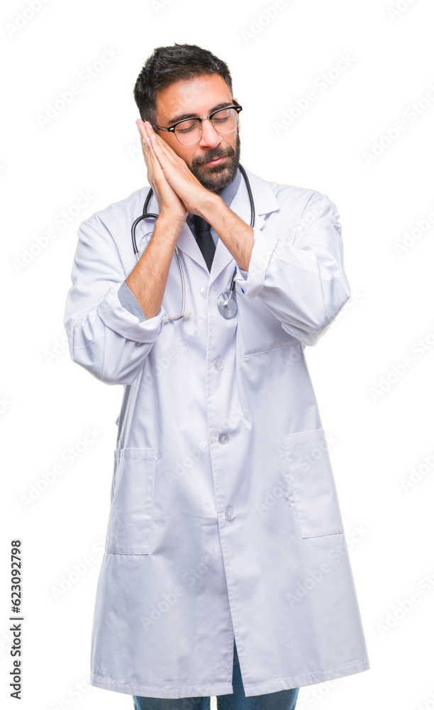 Adult hispanic doctor man over isolated background sleeping tired dreaming and posing with hands together while smiling with closed eyes. Adult hispanic doctor man over isolated background sleeping tired dreaming and posing with hands together while smiling with closed eyes.
