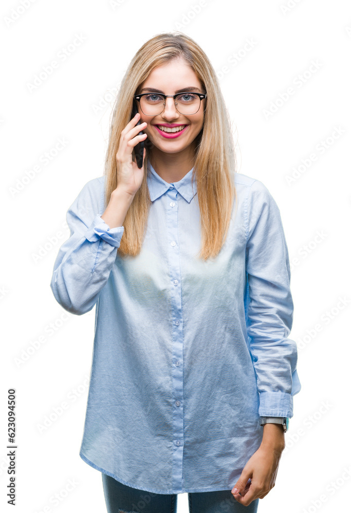 Young beautiful blonde business woman calling on smartphone over isolated background with a happy face standing and smiling with a confident smile showing teeth Young beautiful blonde business woman calling on smartphone over isolated background with a happy face standing and smiling with a confident smile showing teeth