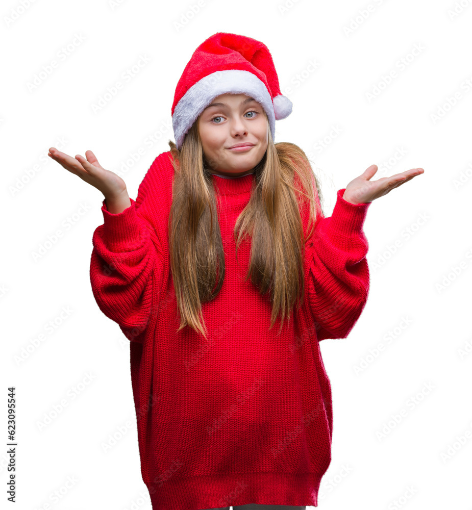 Young beautiful girl wearing christmas hat over isolated background clueless and confused expression with arms and hands raised. Doubt concept. Young beautiful girl wearing christmas hat over isolated background clueless and confused expression with arms and hands raised. Doubt concept.