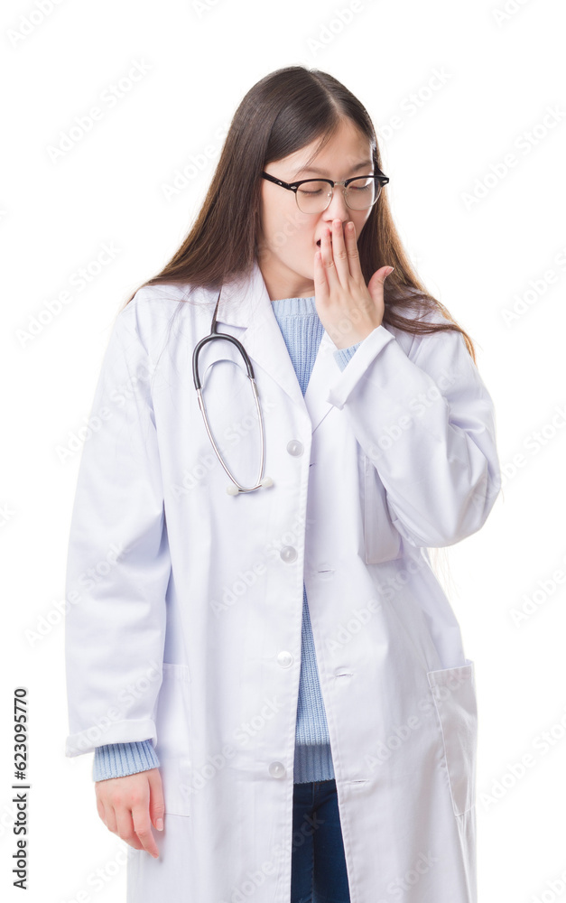 Young Chinese doctor woman over isolated background bored yawning tired covering mouth with hand. Restless and sleepiness. Young Chinese doctor woman over isolated background bored yawning tired covering mouth with hand. Restless and sleepiness.