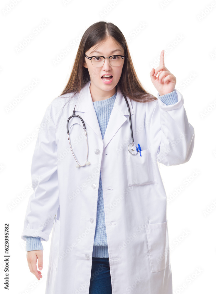Young Chinese doctor woman over isolated background pointing finger up with successful idea. Exited and happy. Number one. Young Chinese doctor woman over isolated background pointing finger up with successful idea. Exited and happy. Number one.