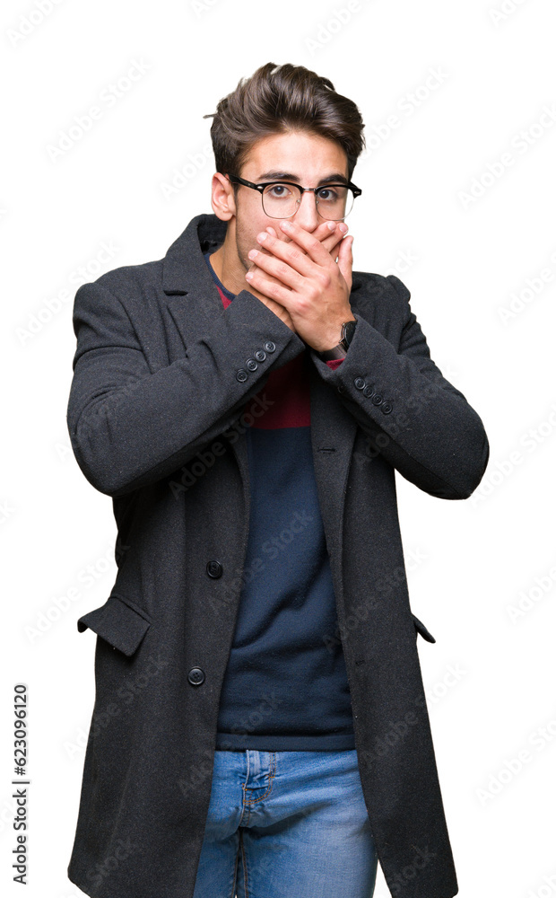 Young handsome elegant man wearing glasses over isolated background shocked covering mouth with hands for mistake. Secret concept. Young handsome elegant man wearing glasses over isolated background shocked covering mouth with hands for mistake. Secret concept.