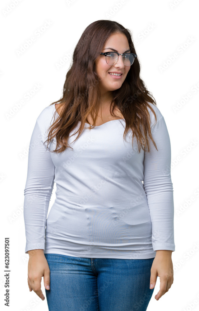 Obraz premium Beautiful plus size young woman over isolated background looking away to side with smile on face, natural expression. Laughing confident.
