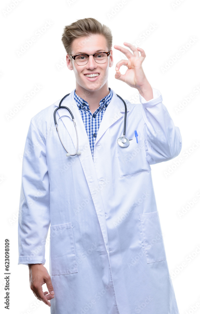 Young handsome blond doctor doing ok sign with fingers, excellent symbol Young handsome blond doctor doing ok sign with fingers, excellent symbol