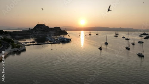 Corfu, Greece. Picturesque Garitsa bay at sunrise. photo