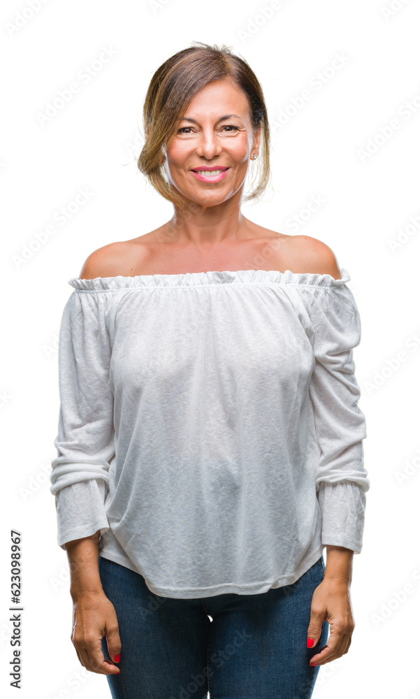 Obraz premium Middle age senior hispanic woman over isolated background with a happy and cool smile on face. Lucky person.